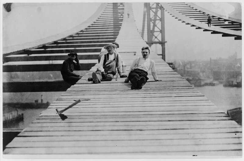 Workers on a bridge construction site