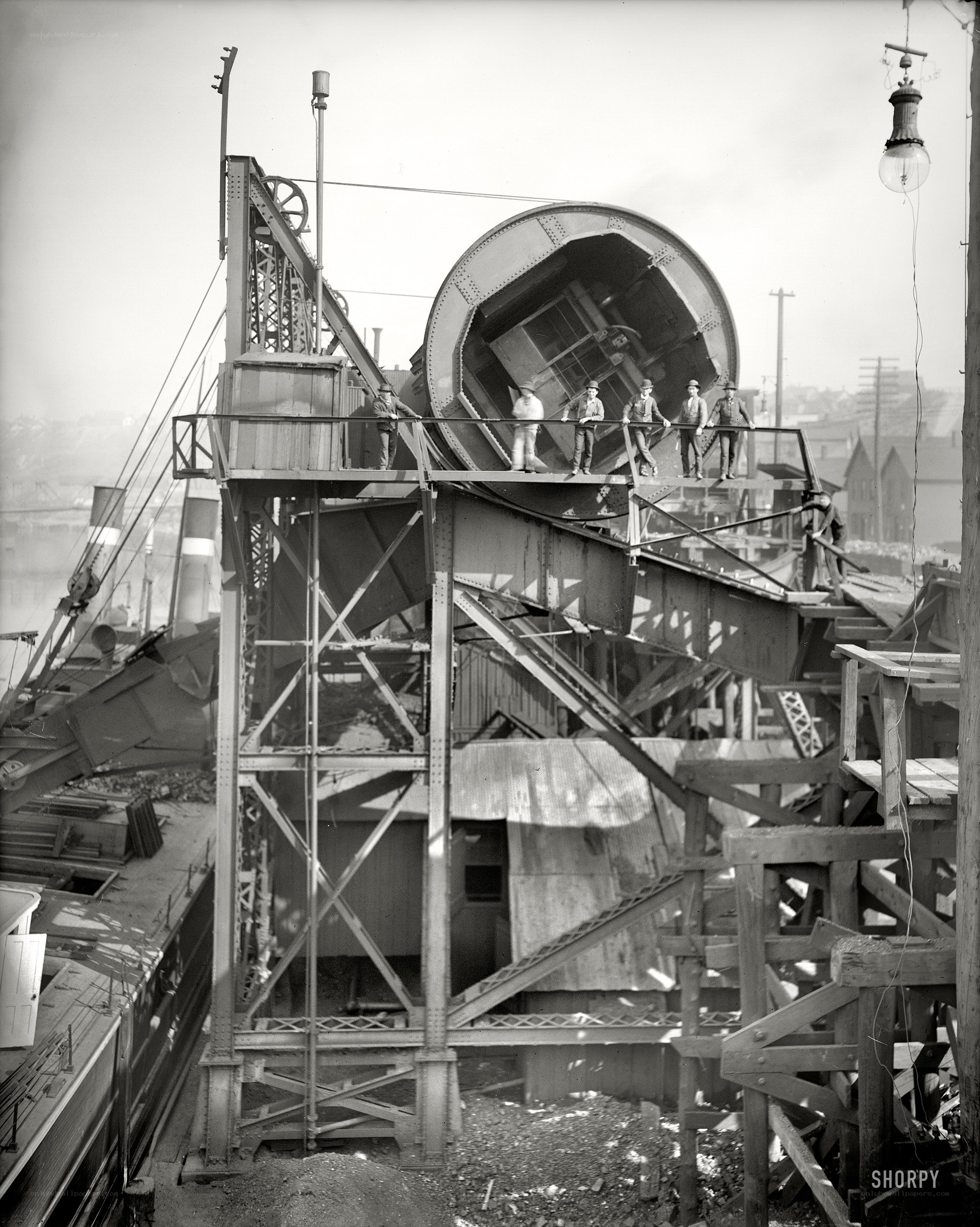 Workers on a large industrial structure