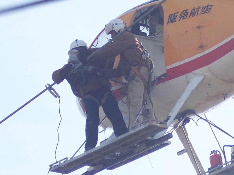 Workers on Helicopter Platform
