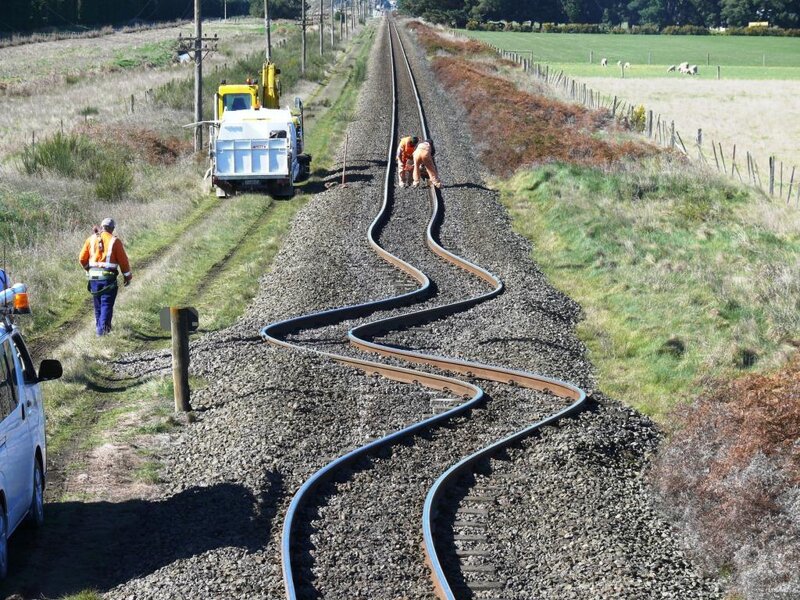 Workers on Railway Tracks