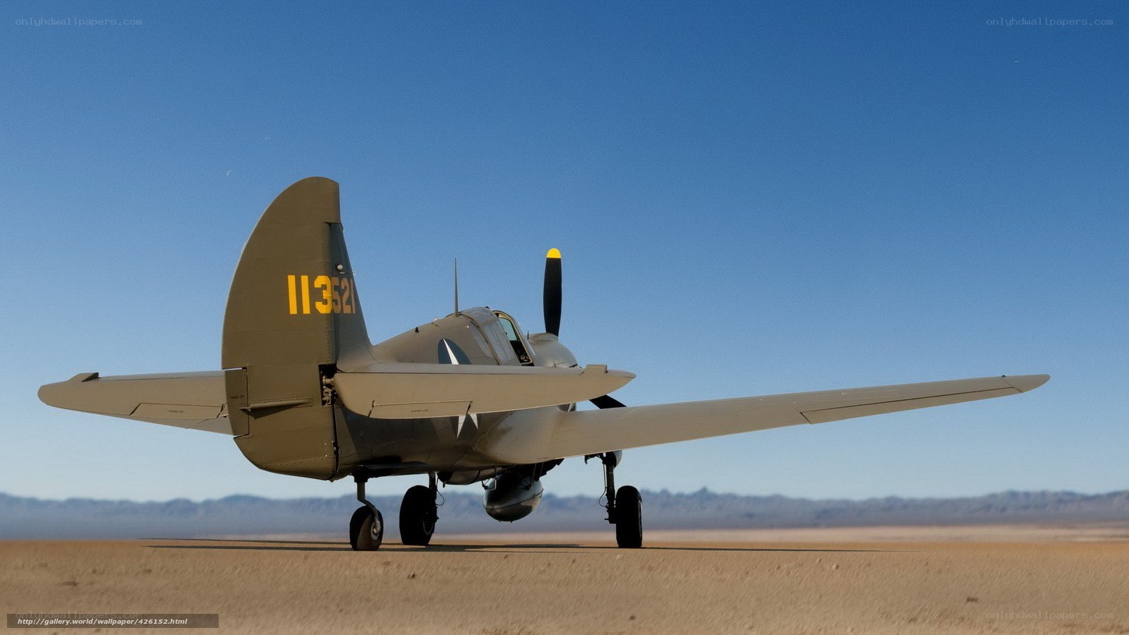 World War II aircraft on desert runway