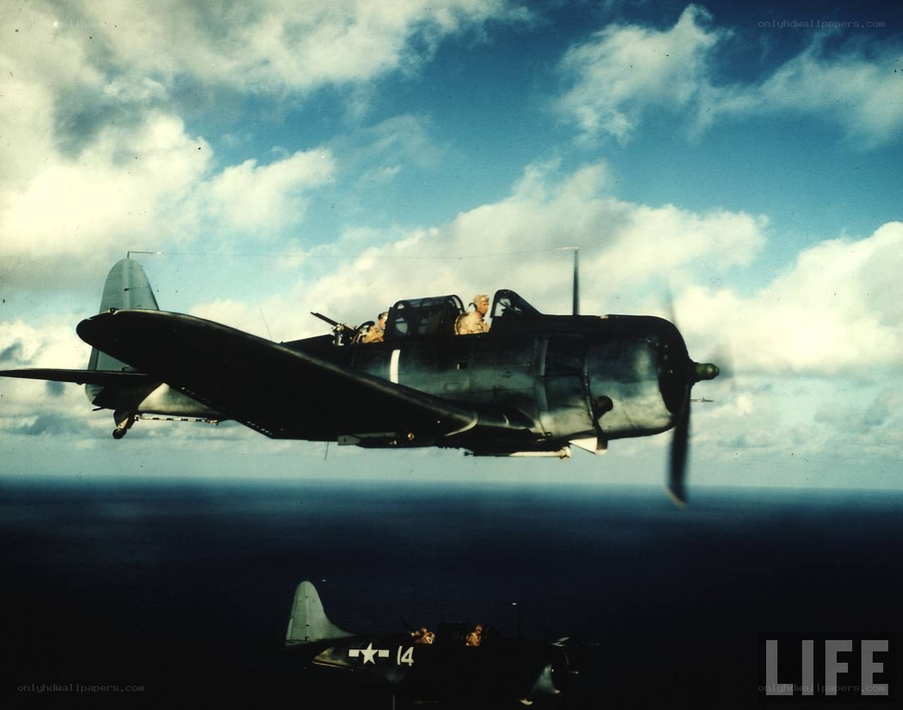 World War II fighter planes in flight