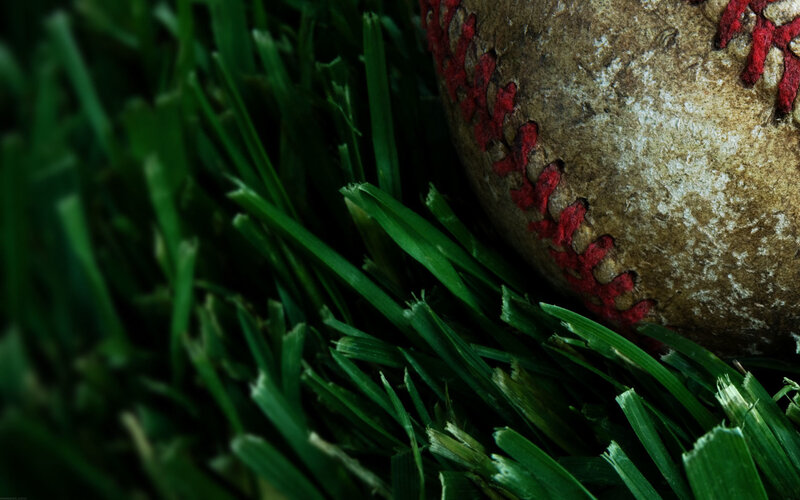 Worn Baseball on Grass — Green