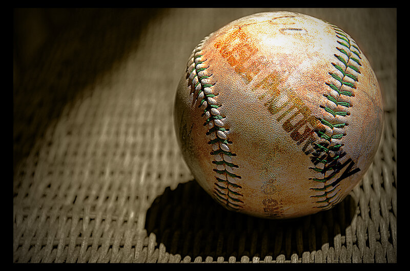 Worn Baseball on Wicker