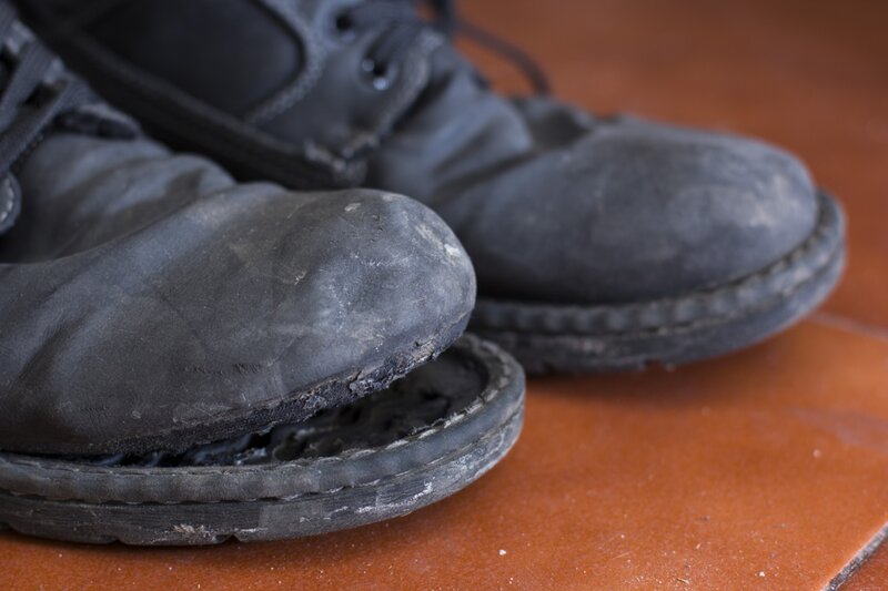 Worn Black Boots