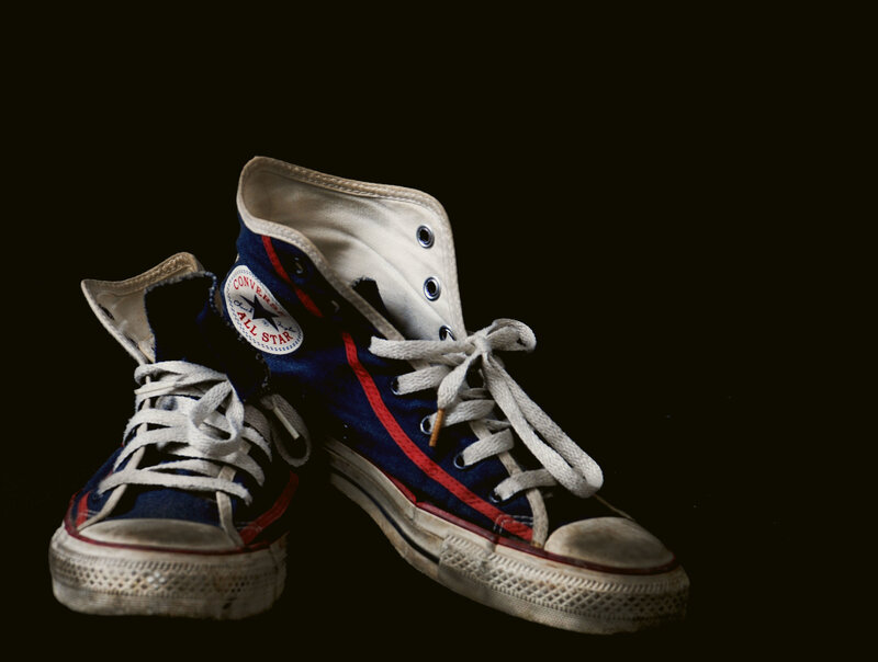 Worn blue Converse sneakers