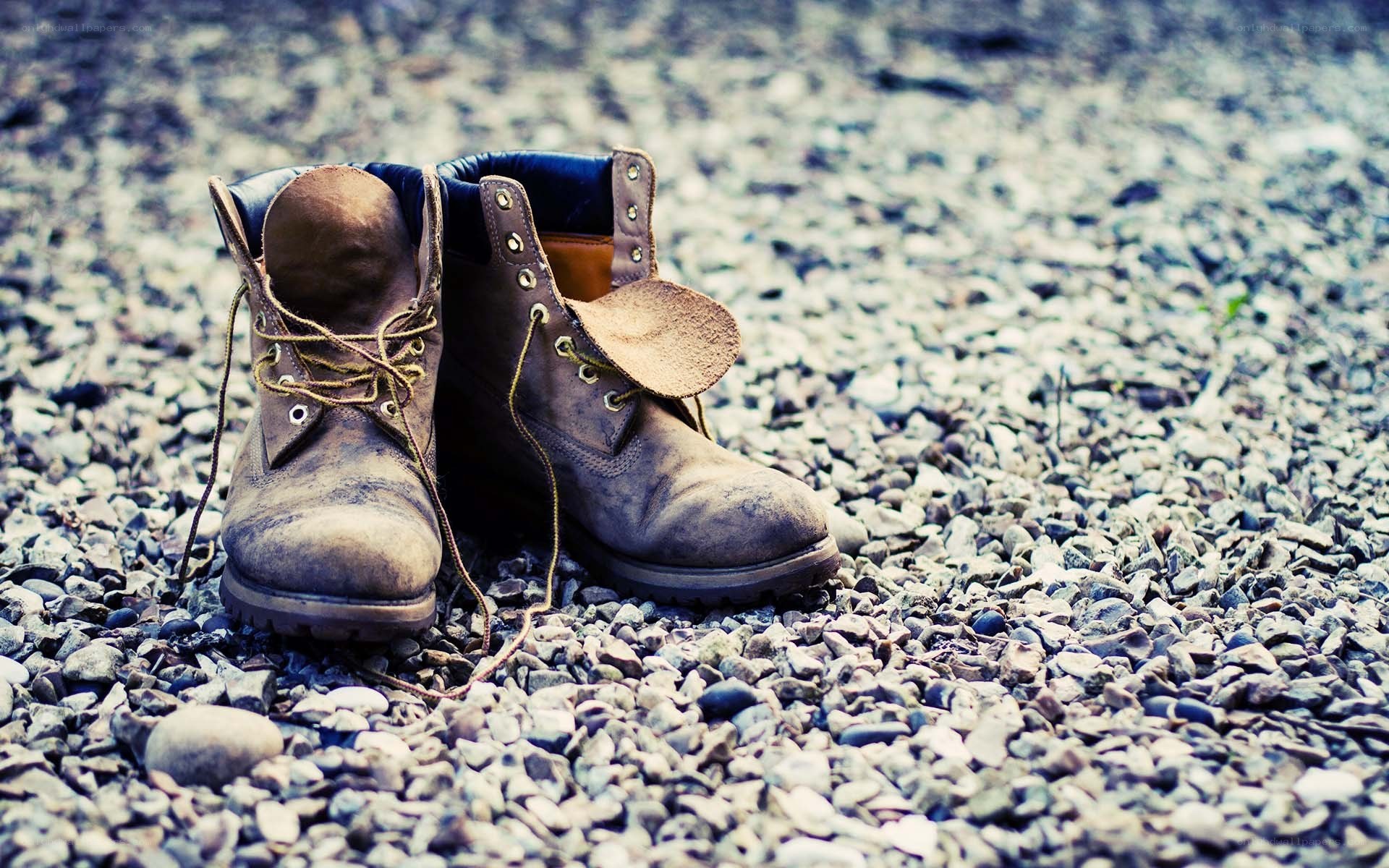Worn boots on gravel