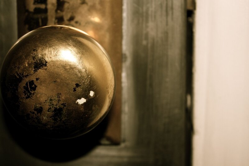 worn brass door knob