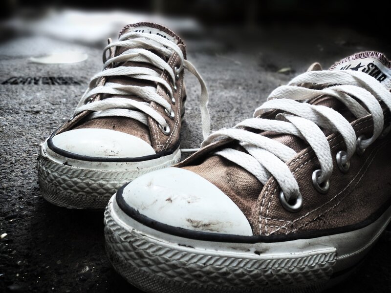 Worn brown Converse sneakers