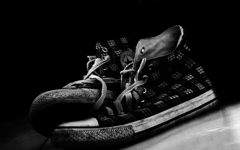worn plaid sneakers