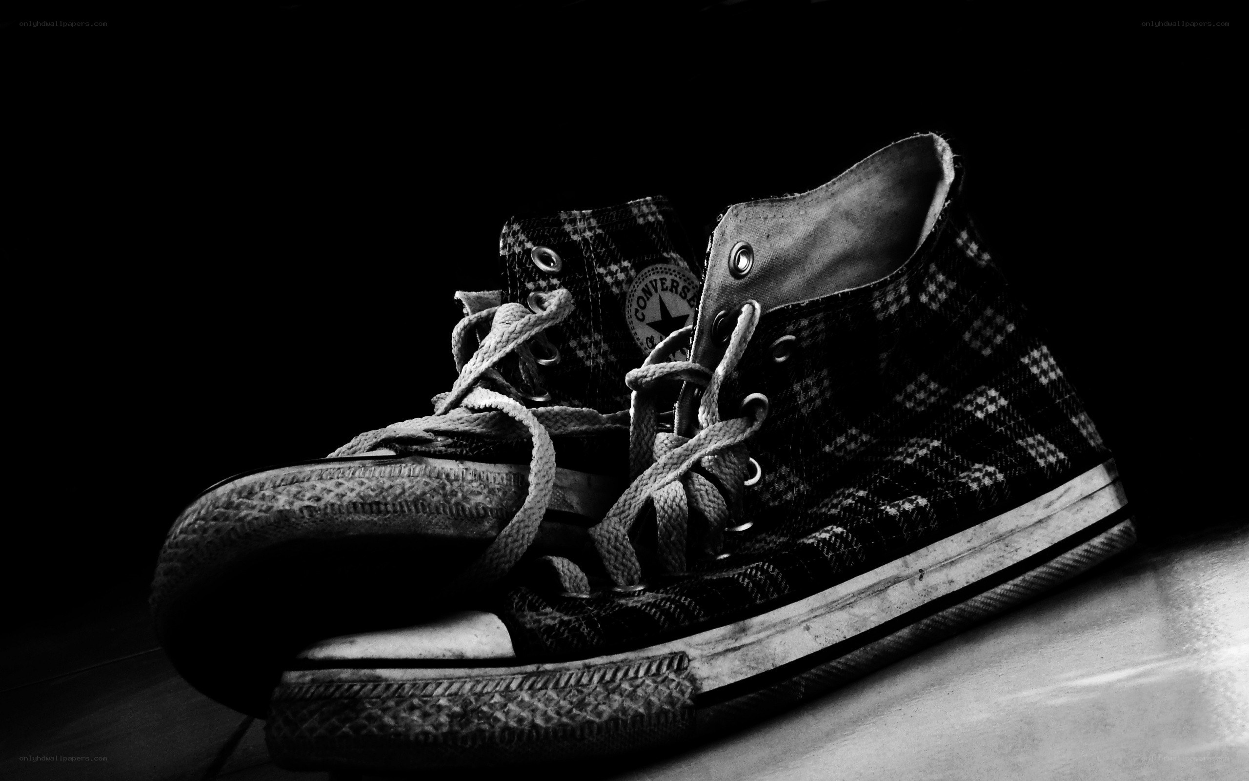 worn plaid sneakers