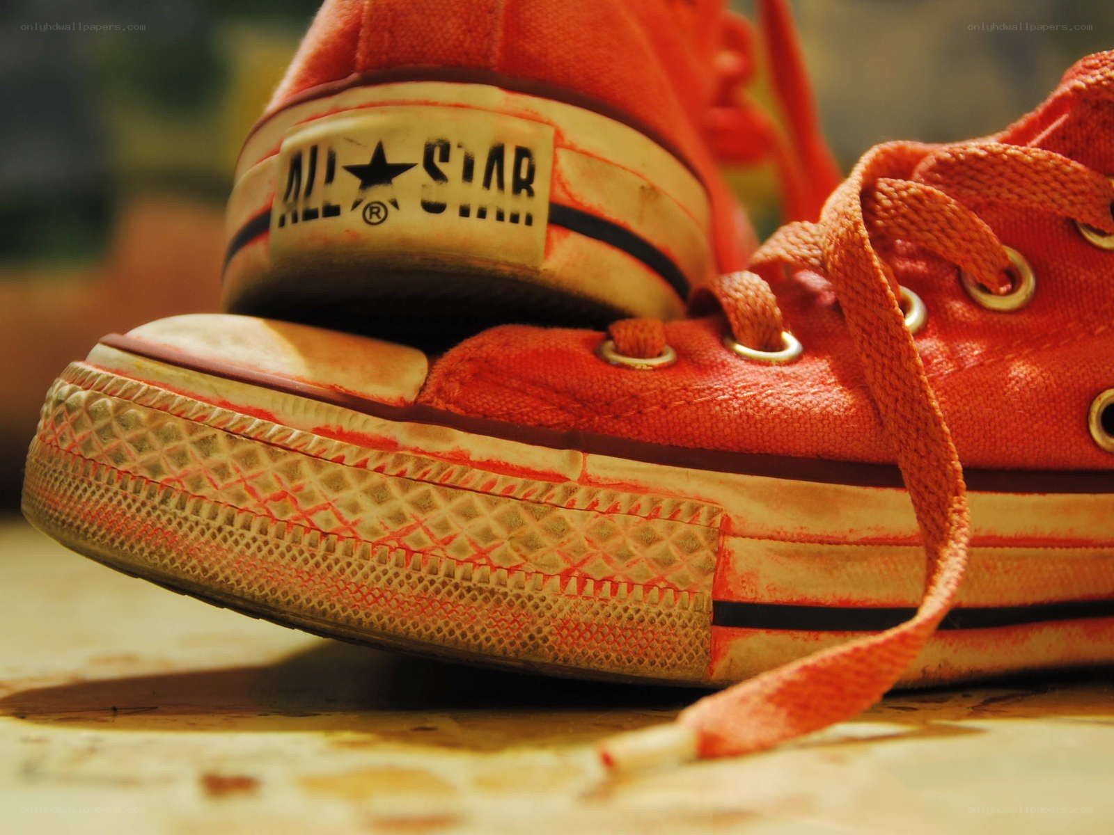 Worn red Converse sneakers