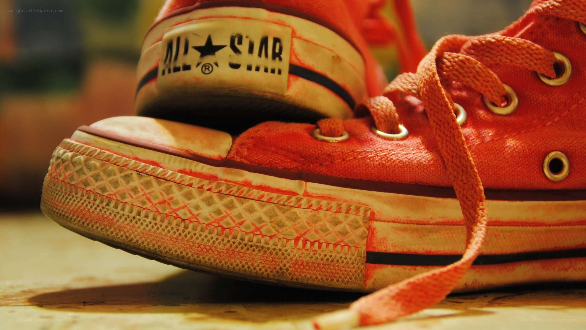 Worn red Converse sneakers