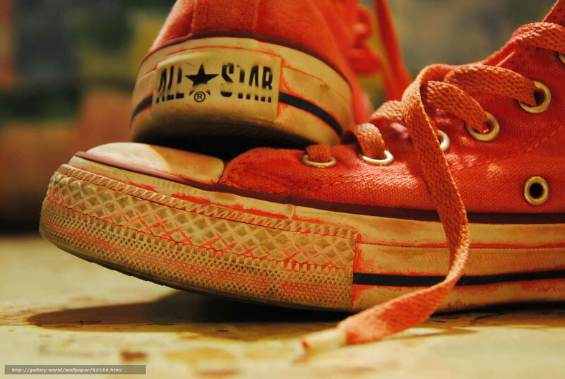 Worn red sneakers