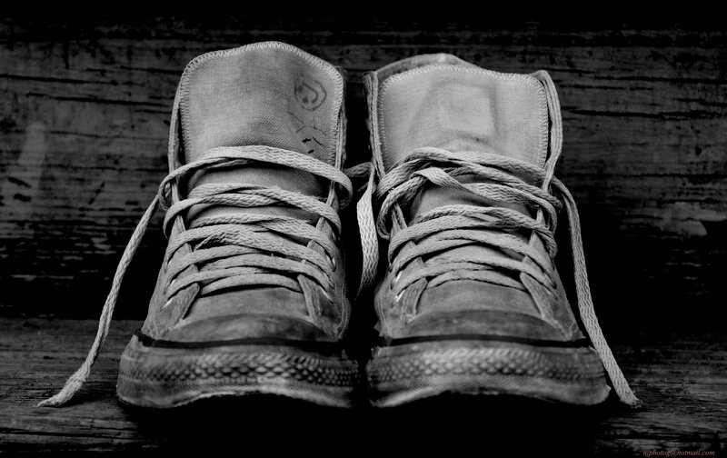 Worn Sneakers on Wood — Black