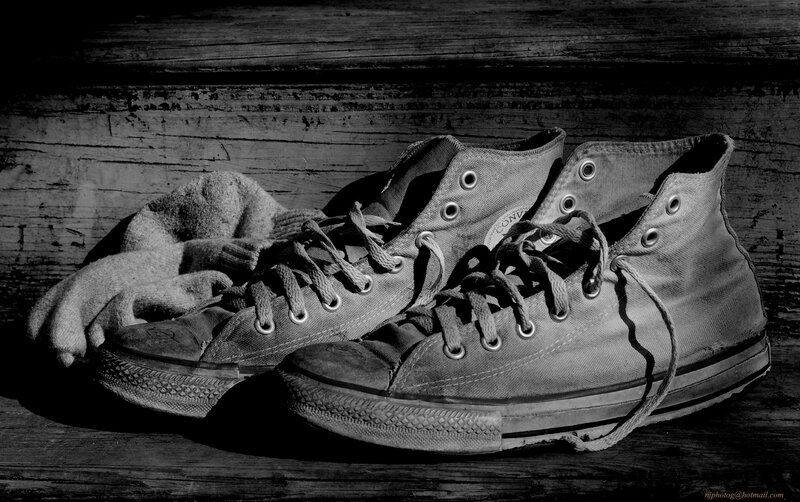 Worn Sneakers on Wood