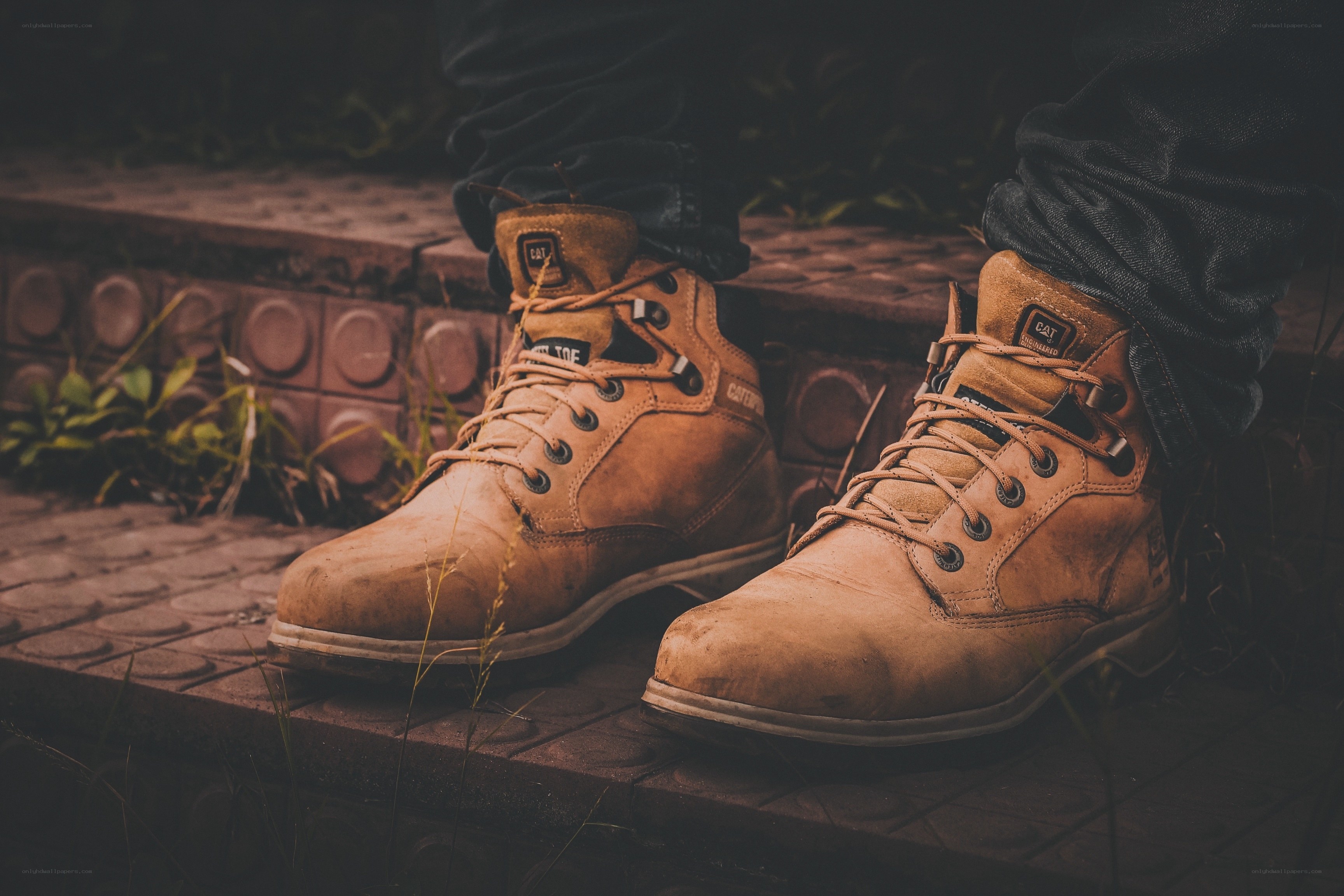 worn work boots on steps