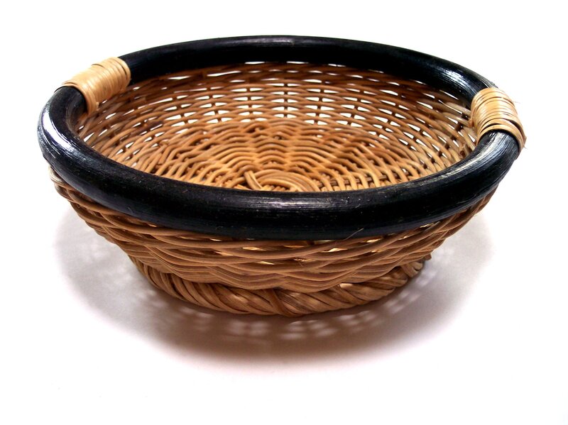woven basket with black rim