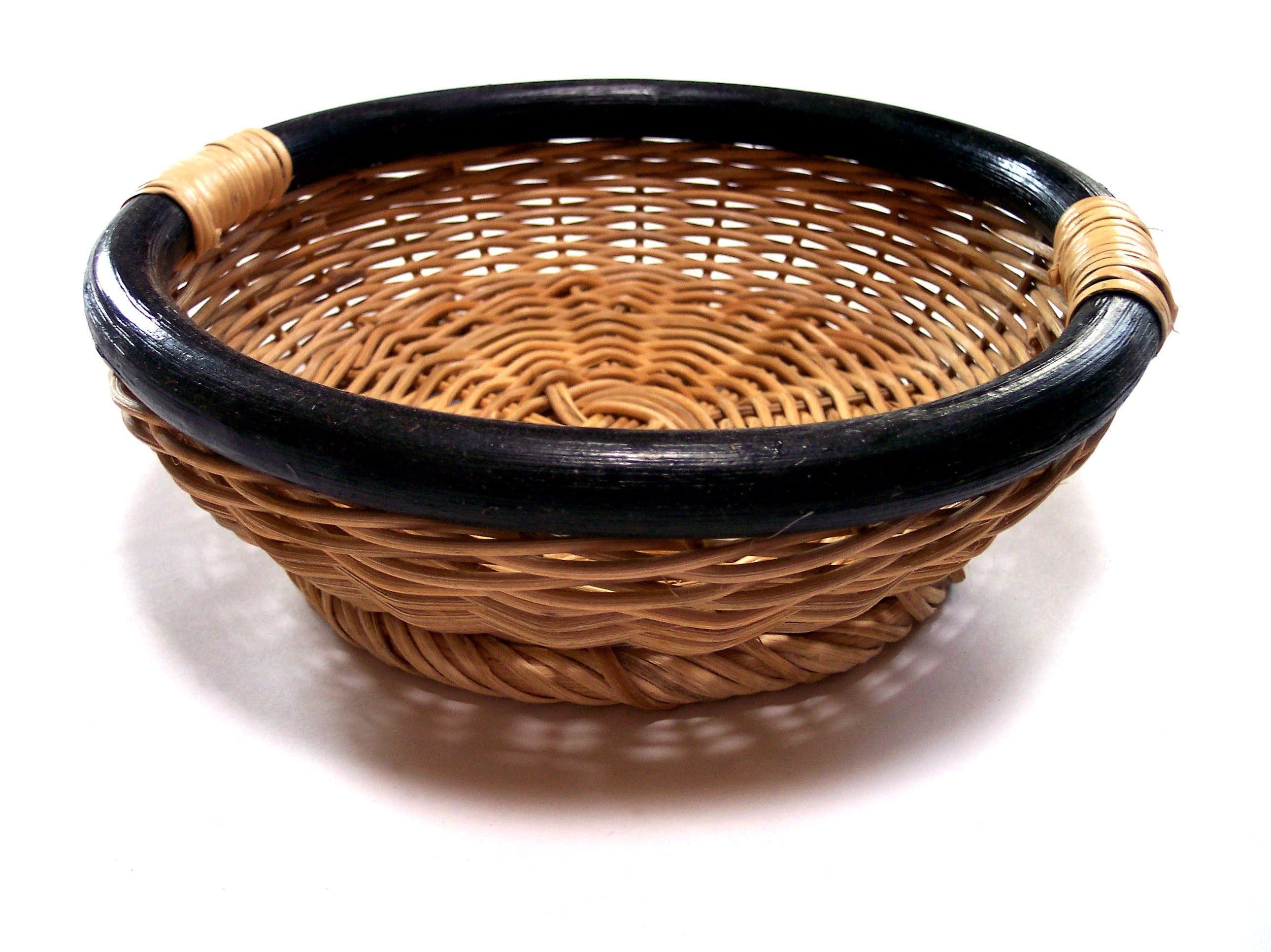 woven basket with black rim