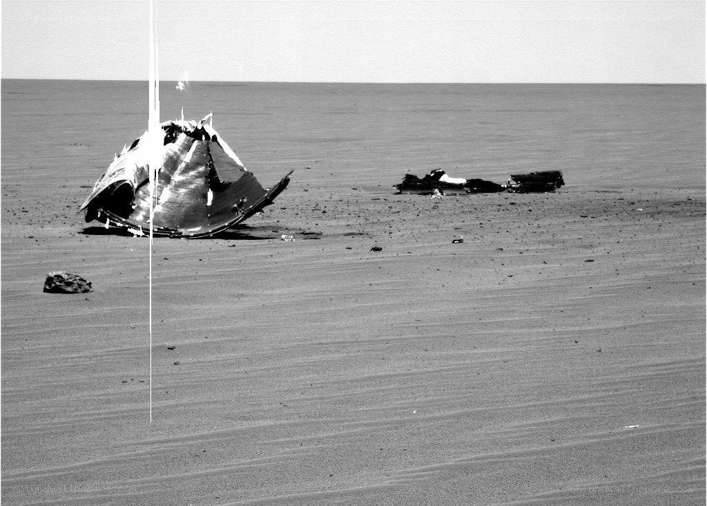 Wreckage in a desert landscape