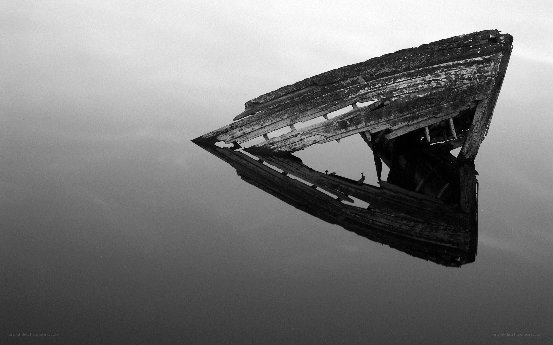wrecked boat in still water