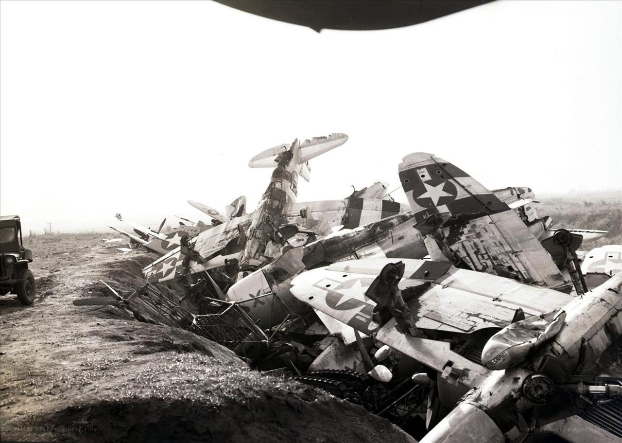 Wrecked military aircraft pile