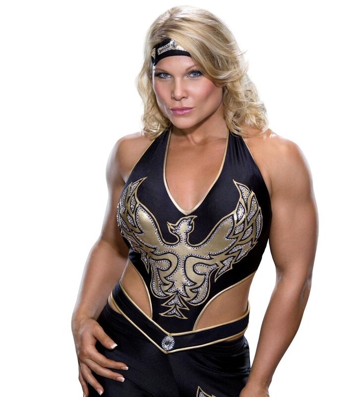 Wrestler in black and gold outfit