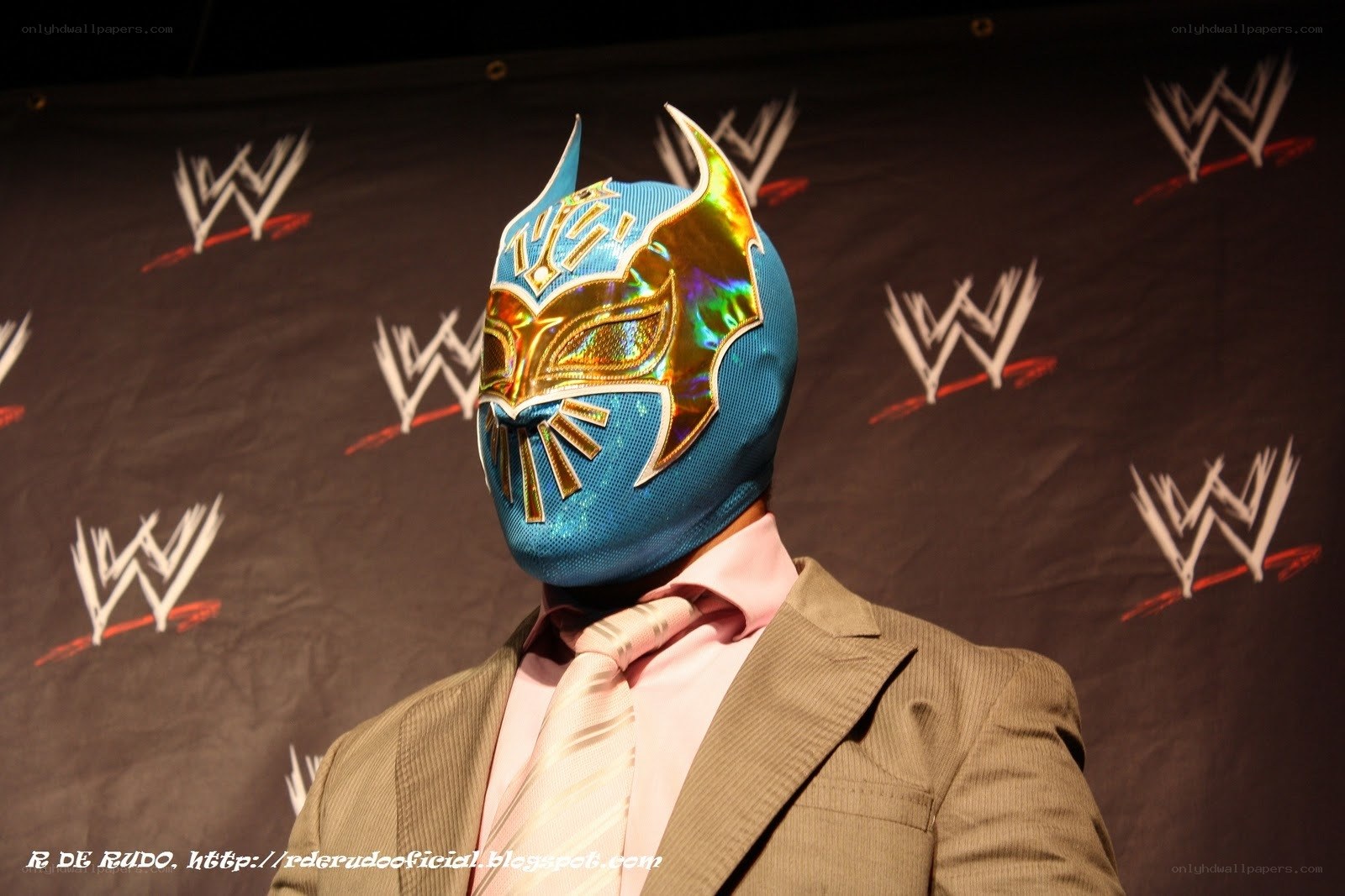 wrestler in blue mask