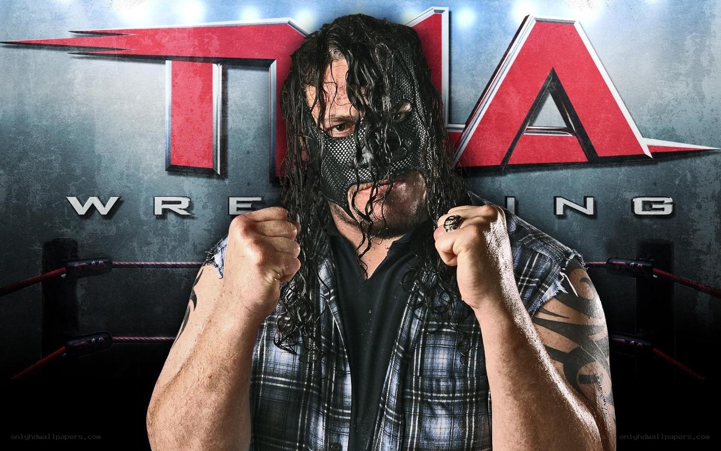 wrestler in mask and plaid