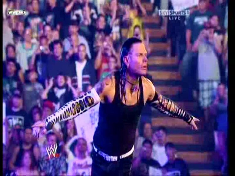 wrestler in ring with crowd