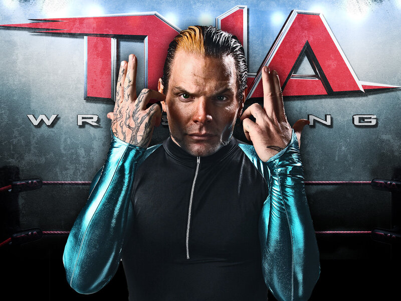 wrestler in ring with TNA logo