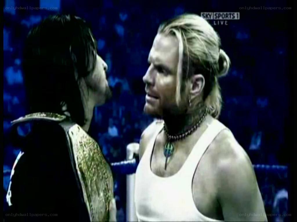 wrestlers face off in ring