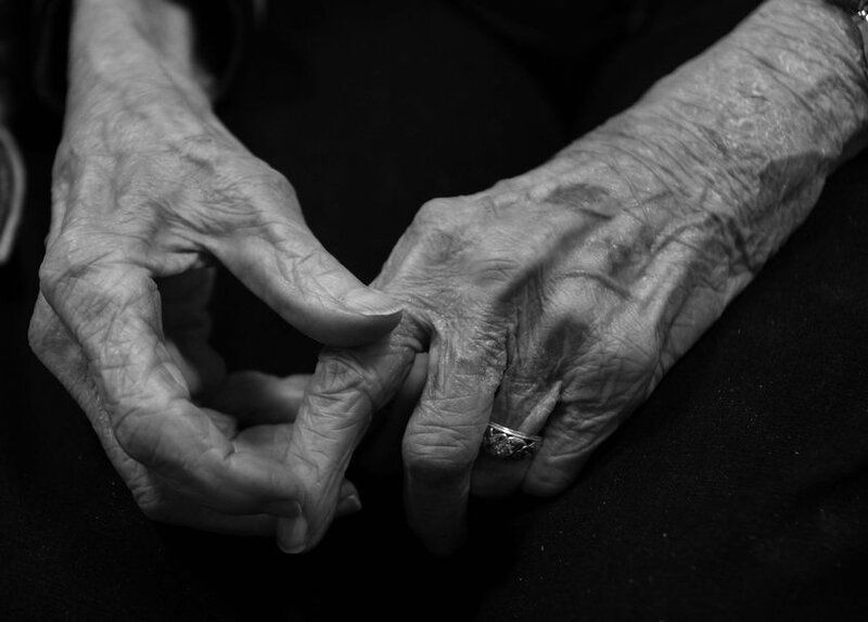 Wrinkled Hands of Elderly Person