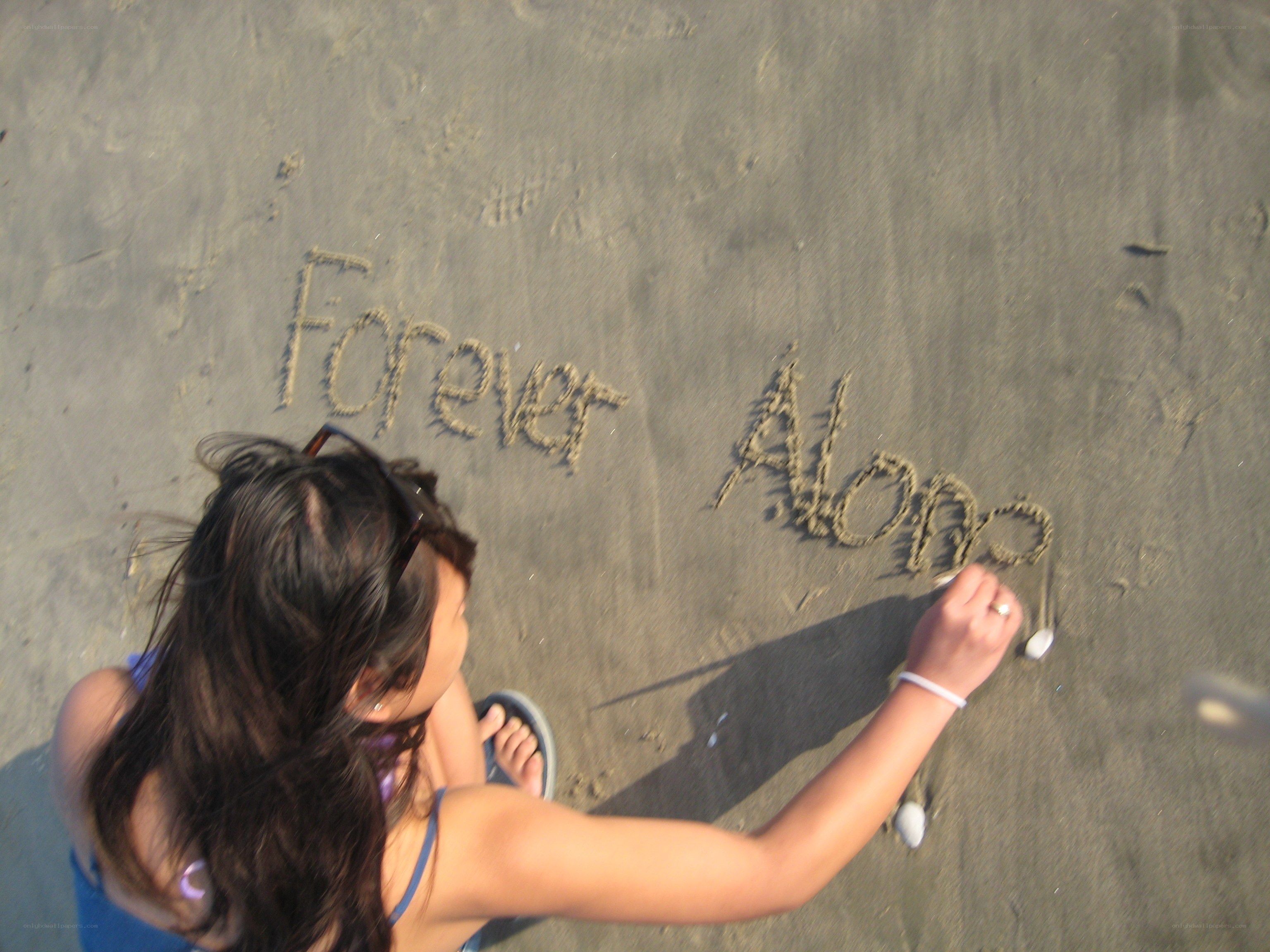 writing forever alone on the beach