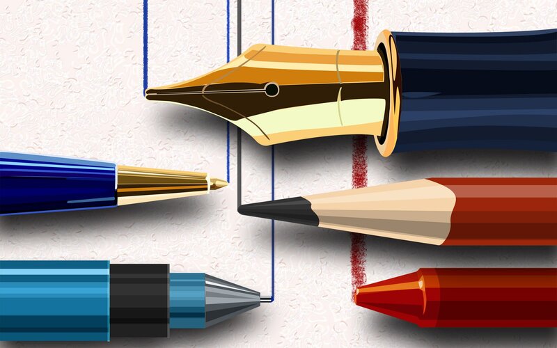 writing instruments on paper