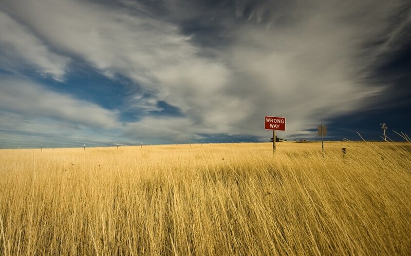 Wrong Way sign in a field