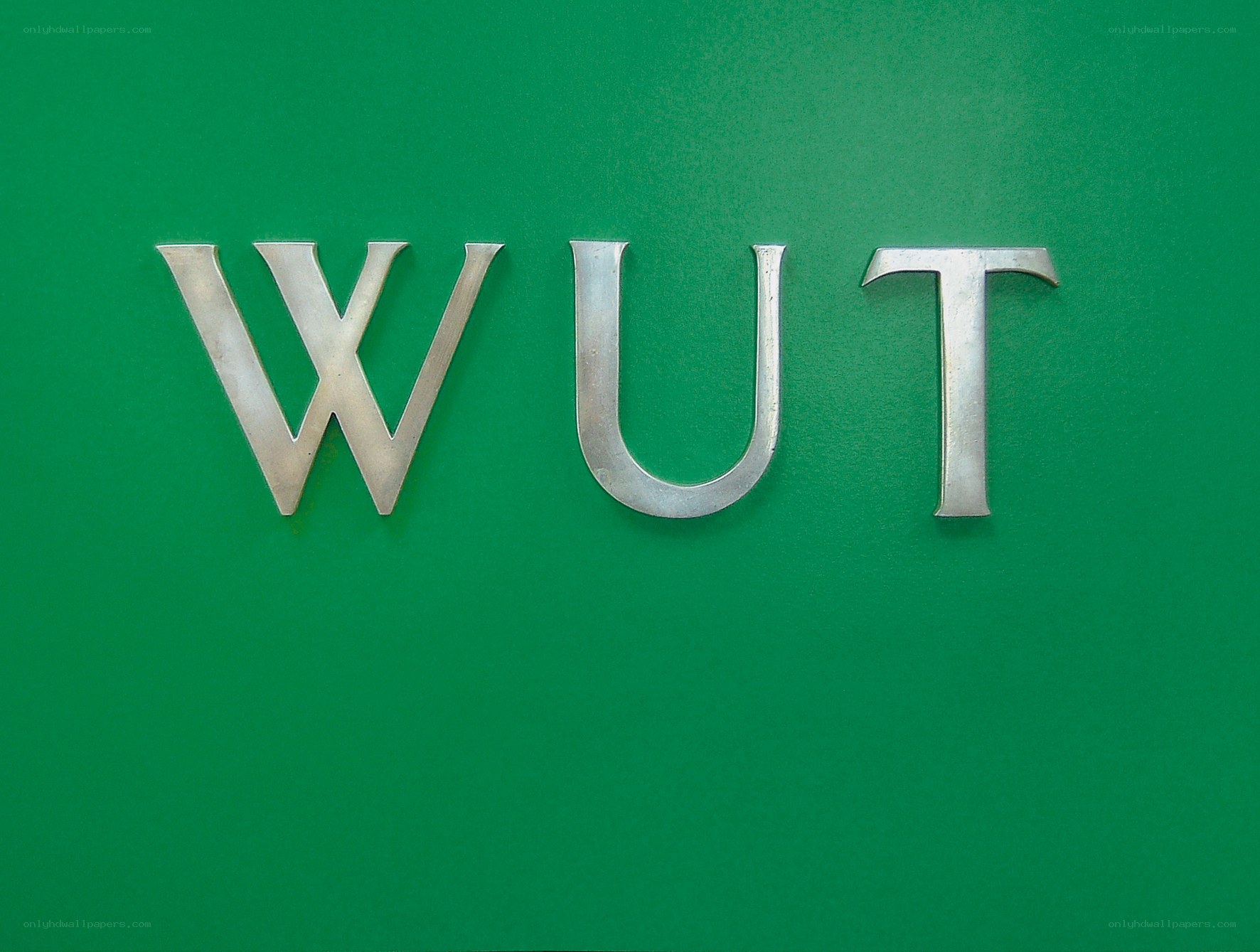 WUT letters on green background