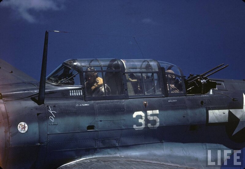 WWII aircraft cockpit with crew