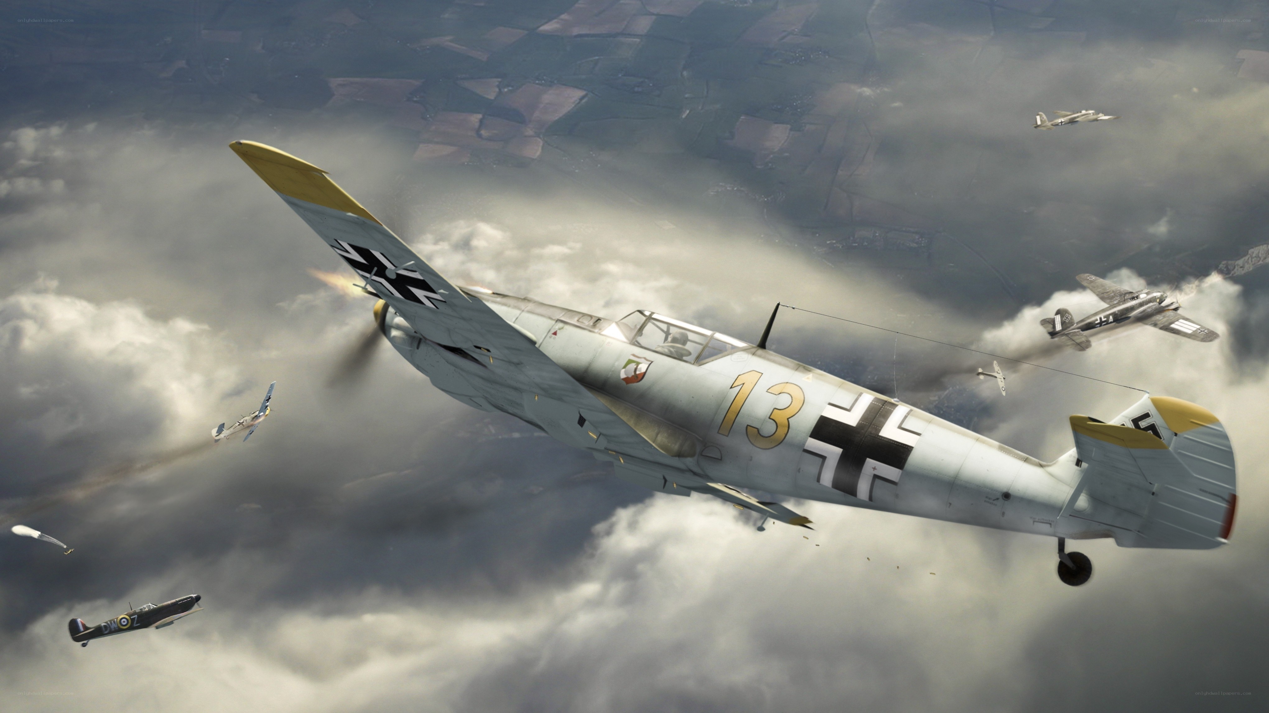 WWII dogfight over clouds