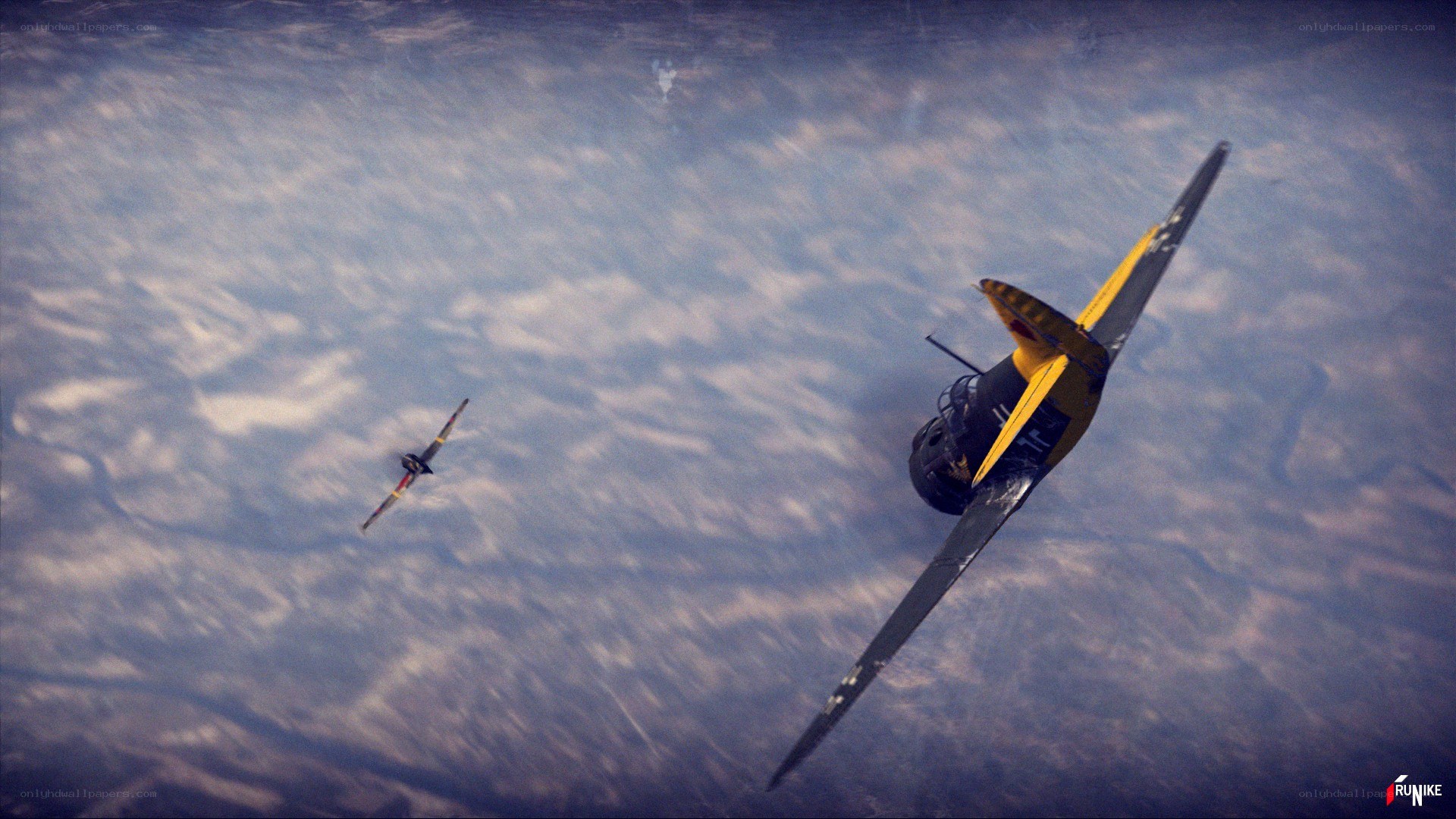 WWII dogfight over clouds