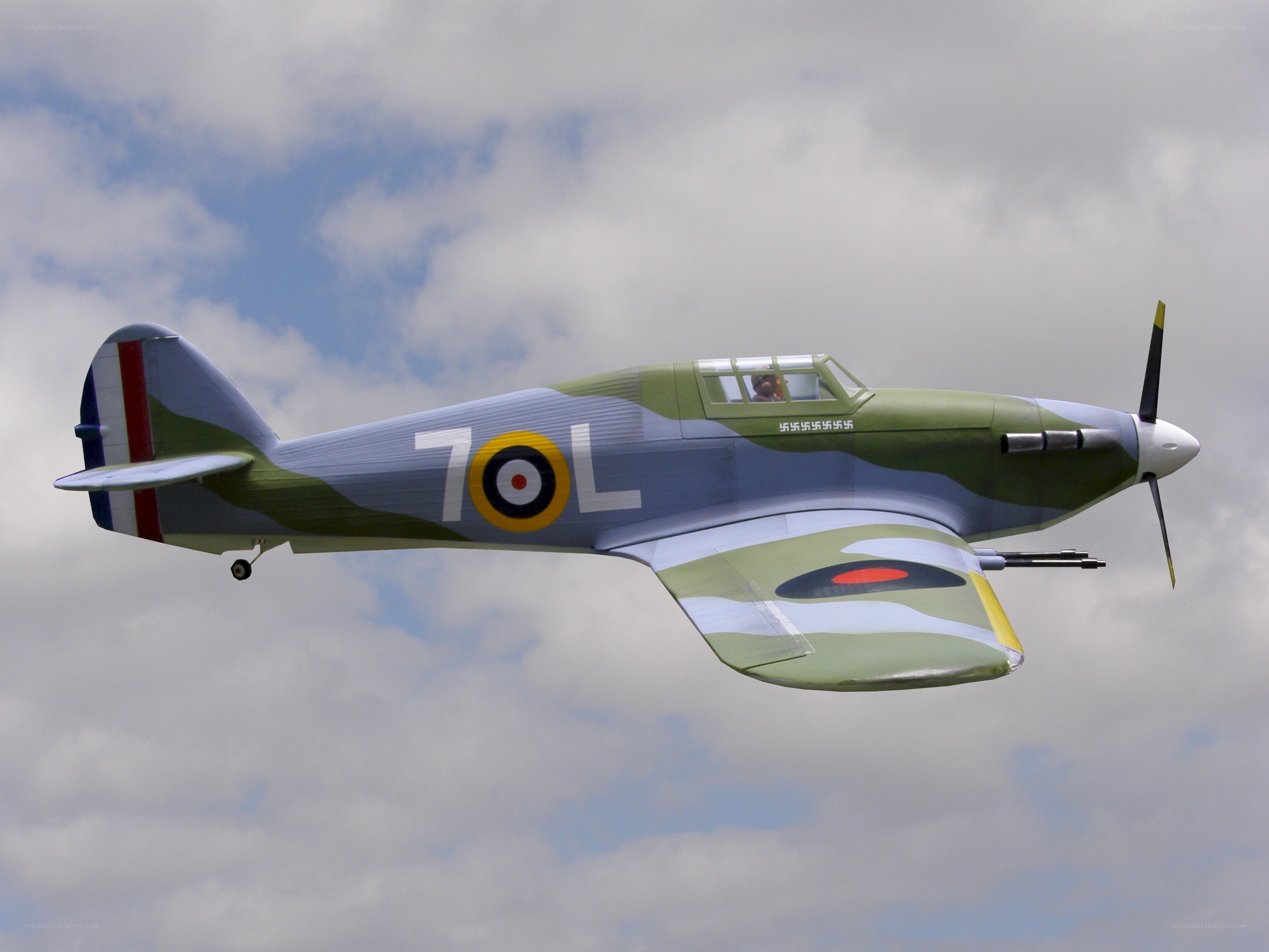 WWII-era fighter plane in flight