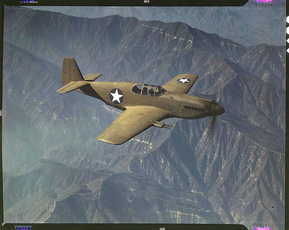 WWII-era fighter plane in flight