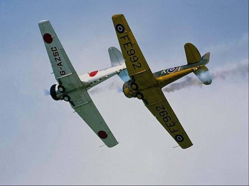 WWII-era planes in flight