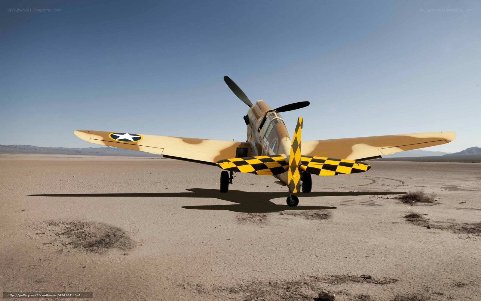 WWII fighter plane in desert