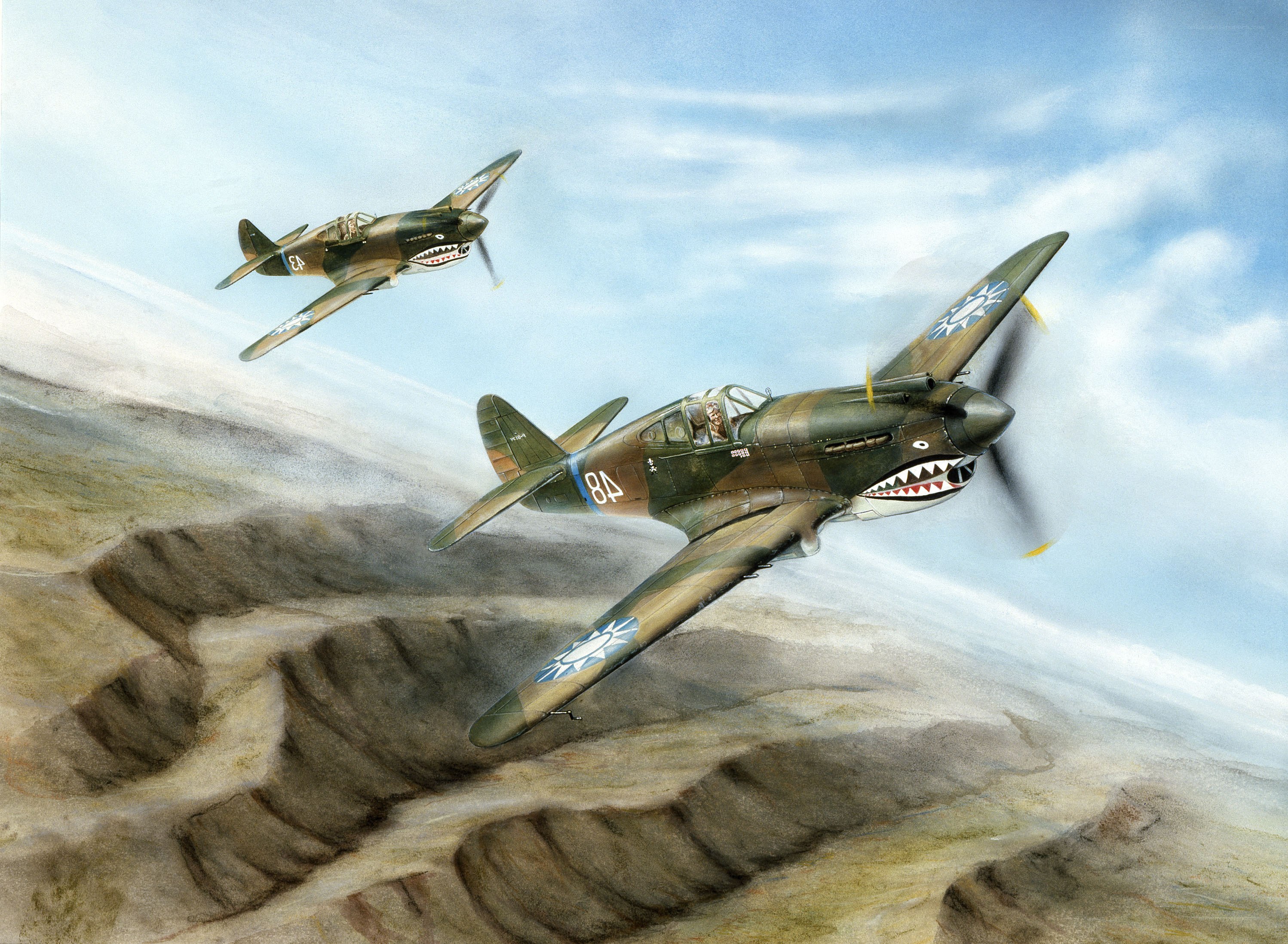 WWII fighter planes in flight