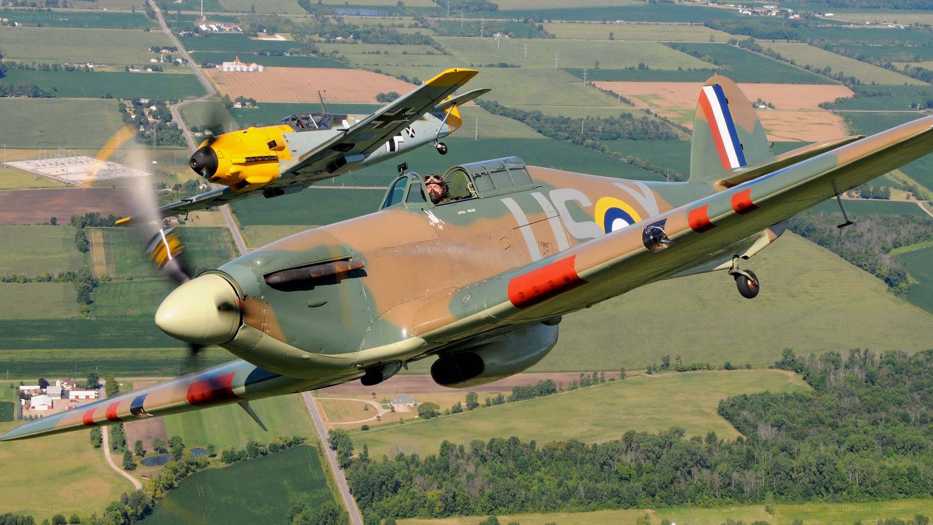WWII fighter planes in flight