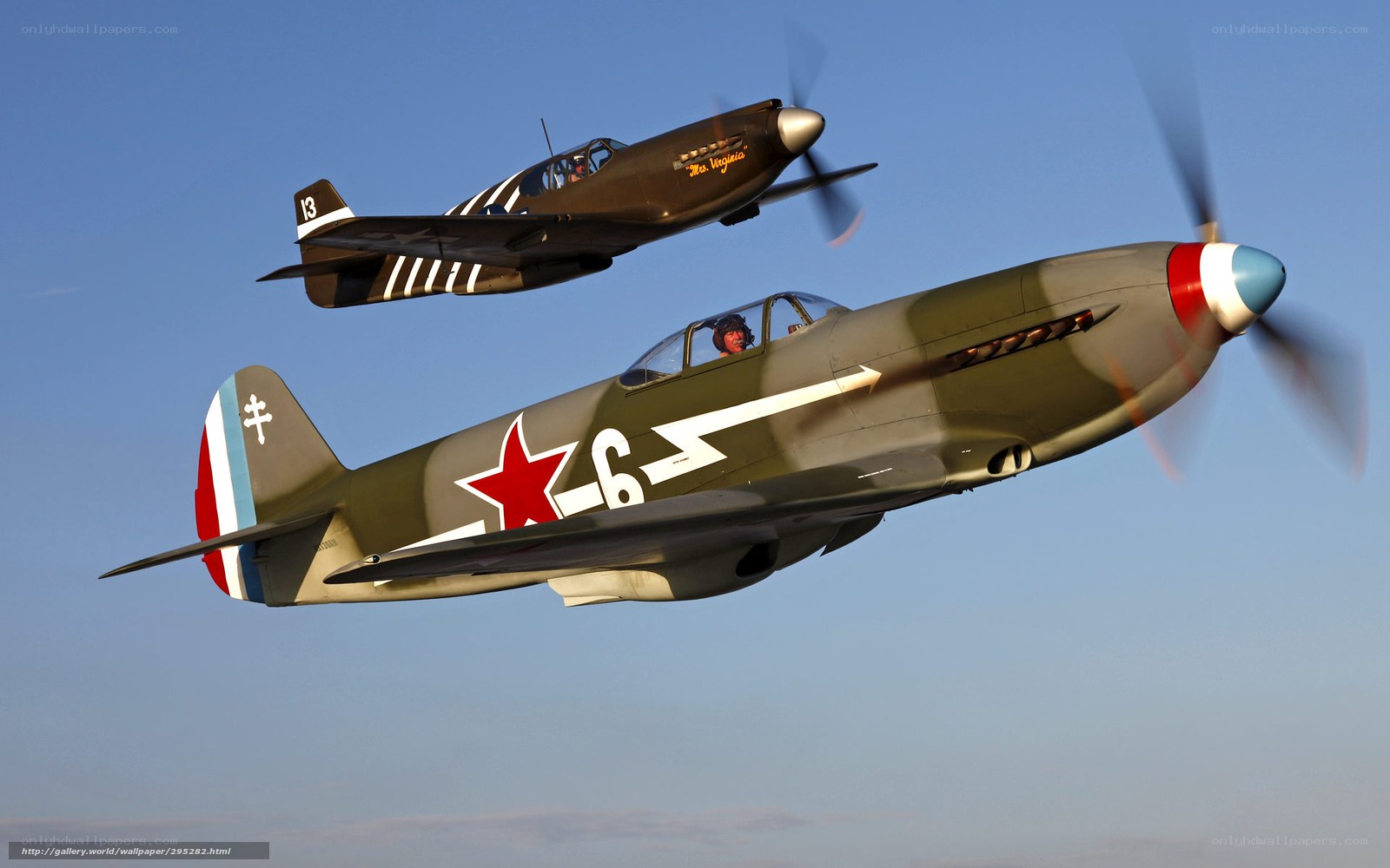 WWII fighter planes in flight