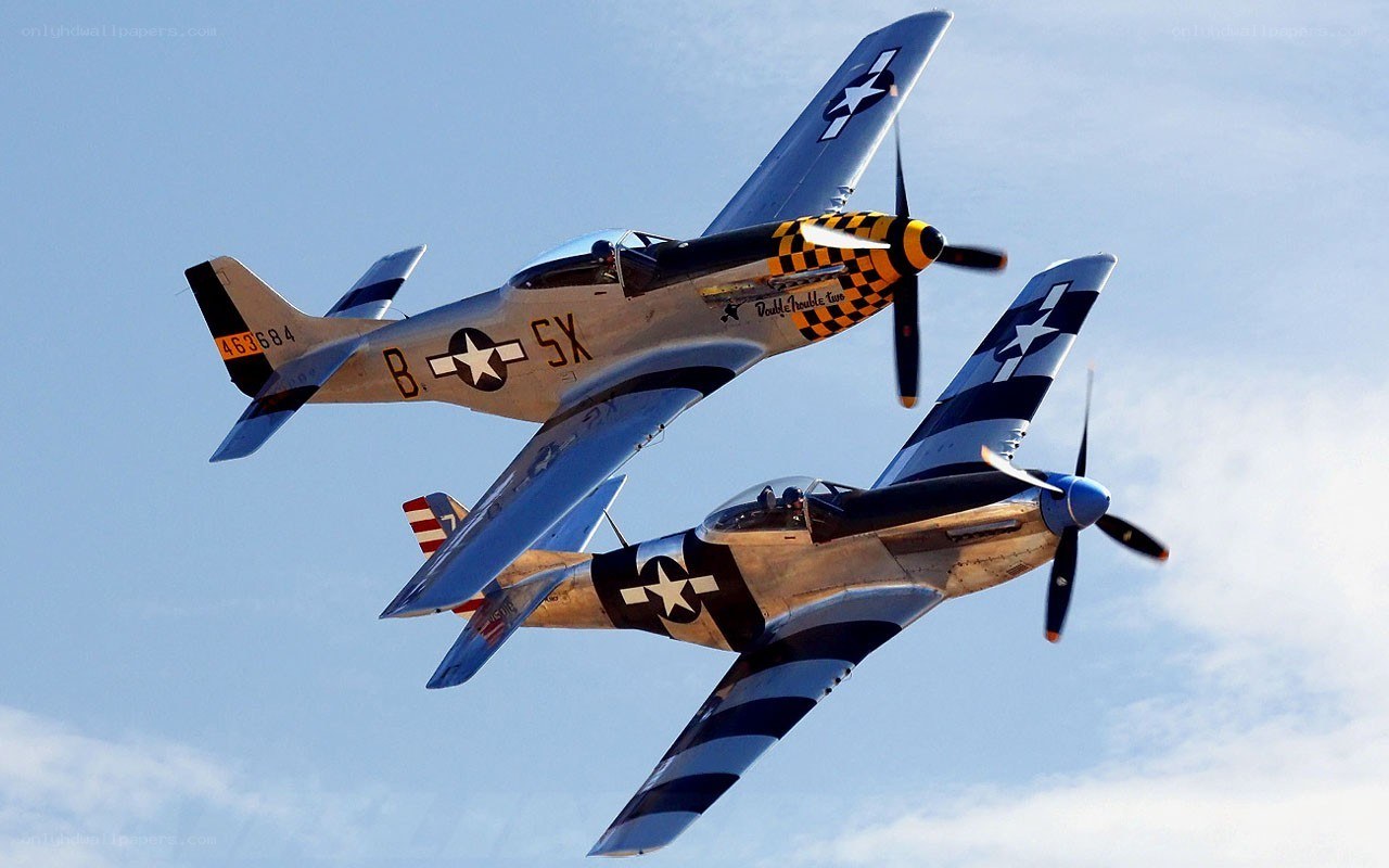 WWII fighter planes in formation