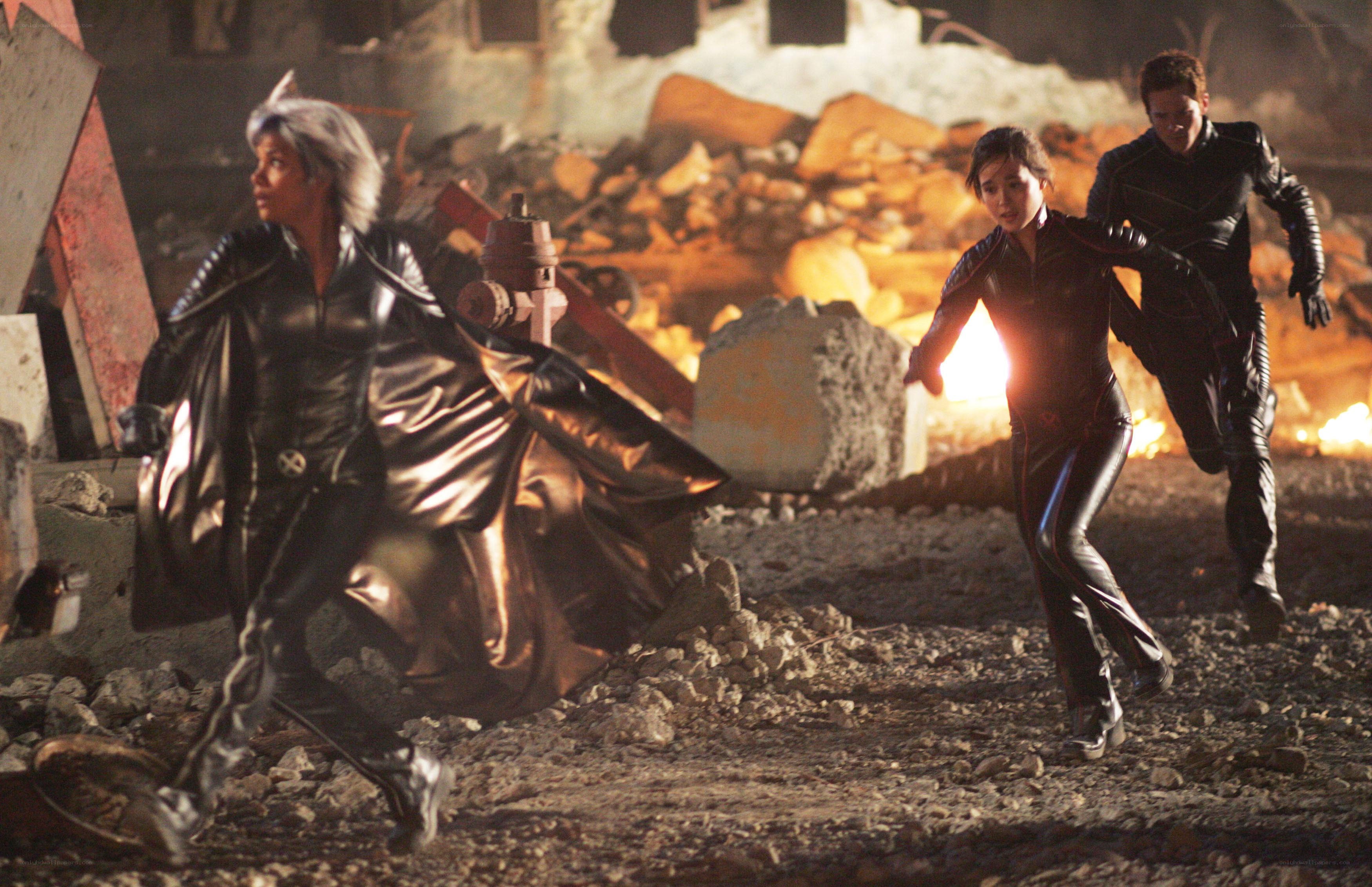 X-Men characters fleeing rubble