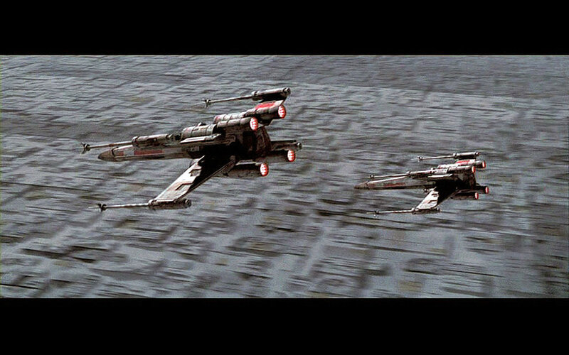 X-wing fighters over water